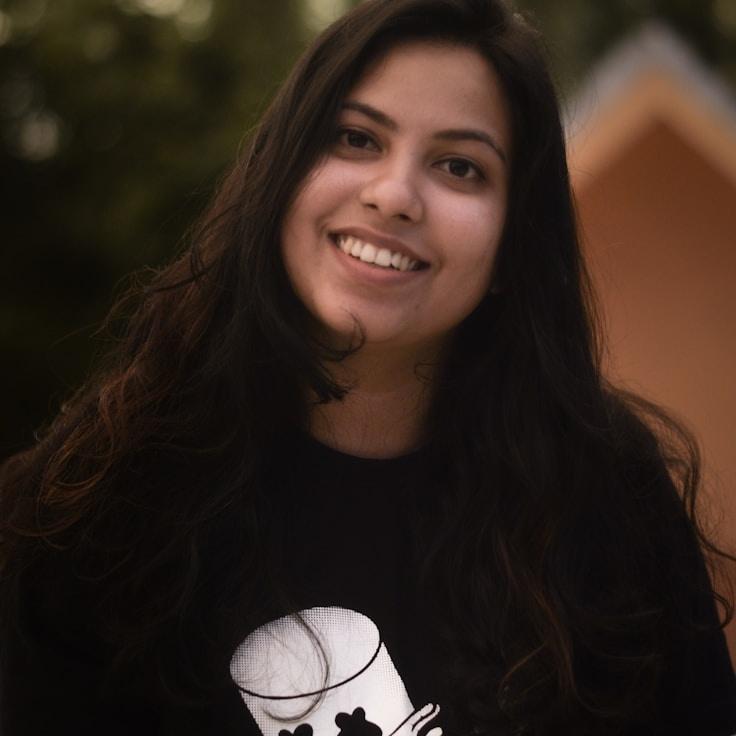 Mia Chen, Client Relations Director, discussing corporate gifting strategy with business clients